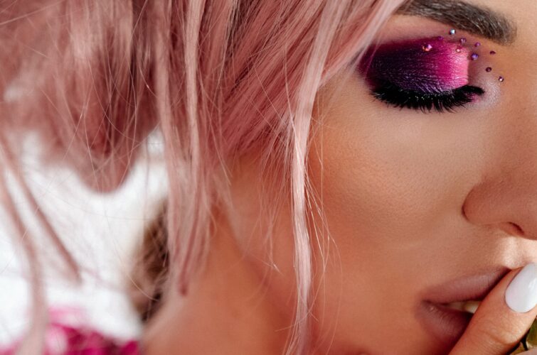 Model with a delicate pink manicure and floral styling, at Armani Nail Boutique, the best in the heart of Vancouver.